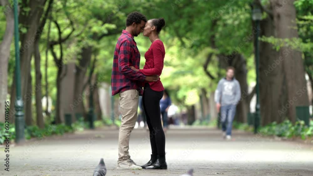 Love, touch and nose with black couple in park for romance, happiness and summer break. Bonding, affection and hug with man and woman on date in nature garden for laughing, playful and peace Love, touch and nose with black couple in park for romance, happiness and summer break. Bonding, affection and hug with man and woman on date in nature garden for laughing, playful and peace
