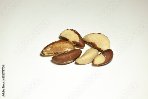 Obraz na płótnie Several brazil nuts on a white background. w salonie