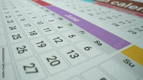 June dates with holidays. First summer month. Macro shot. calendar page for 2023 year from january to december