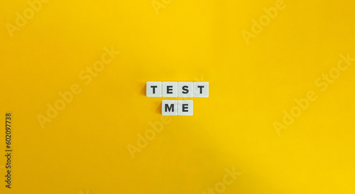 Test Me Banner and Concept. Letter Tiles on Yellow Background. Minimal Aesthetics.