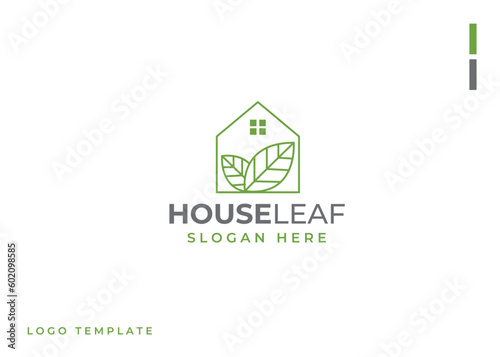 Vector logo with an abstract image of a house with green leaves inside.