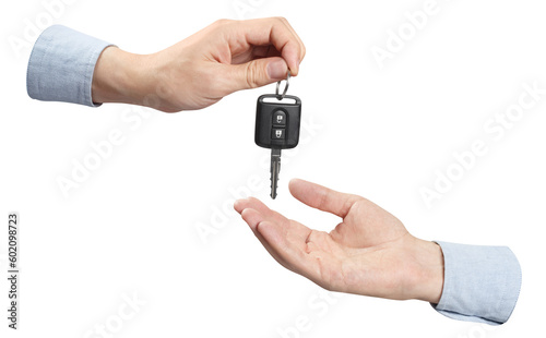 Obraz na płótnie Two hands sharing car key, cut out