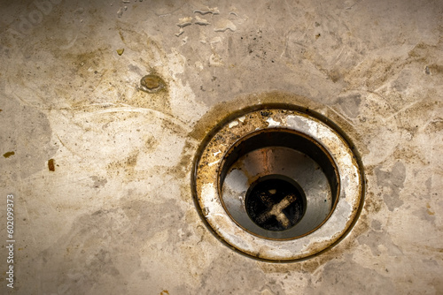 Dirty metal sink, cleaning service concept, old rusty kitchen sink
