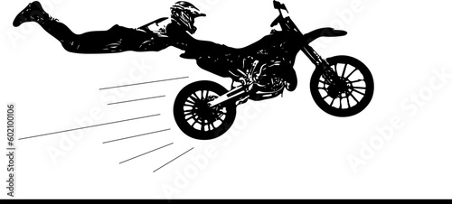 Stunning Silhouette: Bike Stuntman Displaying Acrobatic Talents