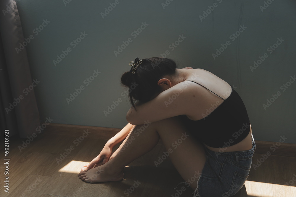 Fototapeta premium panic attacks alone young girl sad fear stressful depressed emotional.crying use hand cover face begging help.stop abusing domestic violence in women,person with health anxiety,people bad feeling down
