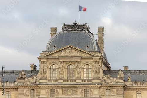 Paris, France. April 2023. French architecture at The Louvre and Tulleries Gardens. Classic french buildings. Parisian style architecture photo