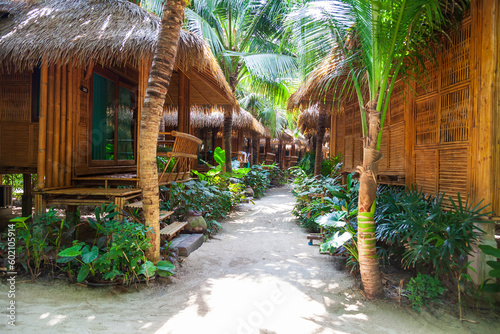 heavenly vacation on phi phi don island in thailand in a hotel with bamboo bungalow among palm trees