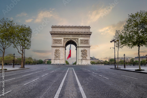 Arc De Triomphe in Paris, France. Monument and landmark at the top of the Champs Elysees.  photo