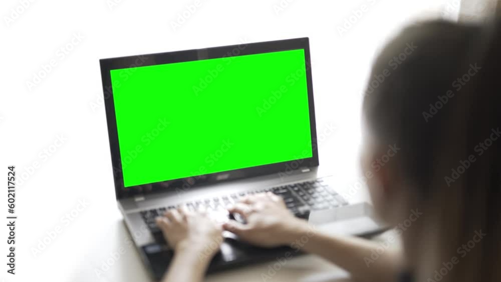 Smooth work of hands at the computer, close-up of a green screen designed for chrome key Smooth work of hands at the computer, close-up of a green screen designed for chrome key