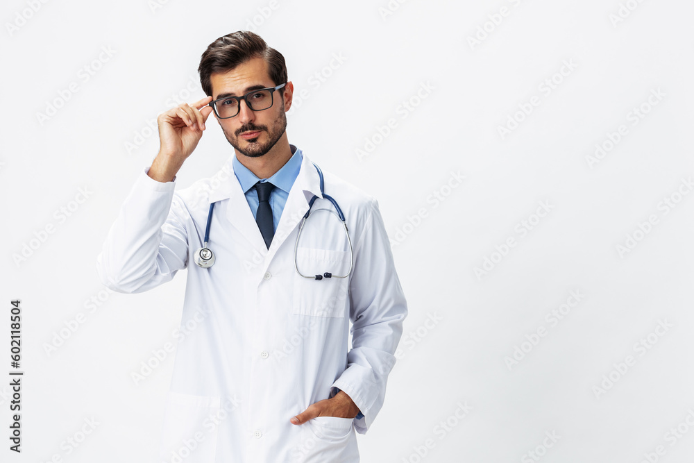 Man portrait doctor in white coat and eyeglasses and stethoscope looking into camera shows hands on background on white isolated background, space for copy, space for text, health Man portrait doctor in white coat and eyeglasses and stethoscope looking into camera shows hands on background on white isolated background, space for copy, space for text, health