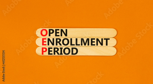 OEP symbol. Concept words OEP Open enrollment period on beautiful wooden sticks. Beautiful orange table orange background. Medical and OEP Open enrollment period concept. Copy space. photo