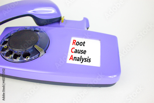 RCA root cause analysis symbol. Concept words RCA root cause analysis on beautiful old disk phone. Beautiful white table white background. Business and RCA root cause analysis concept. Copy space.
