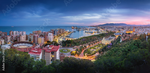 Fototapeta Naklejka Na Ścianę i Meble -  Panoramic aerial view with Plaza de Toros, Port of Malaga, City Hall and Cathedral at sunset - Malaga, Andalusia, Spain