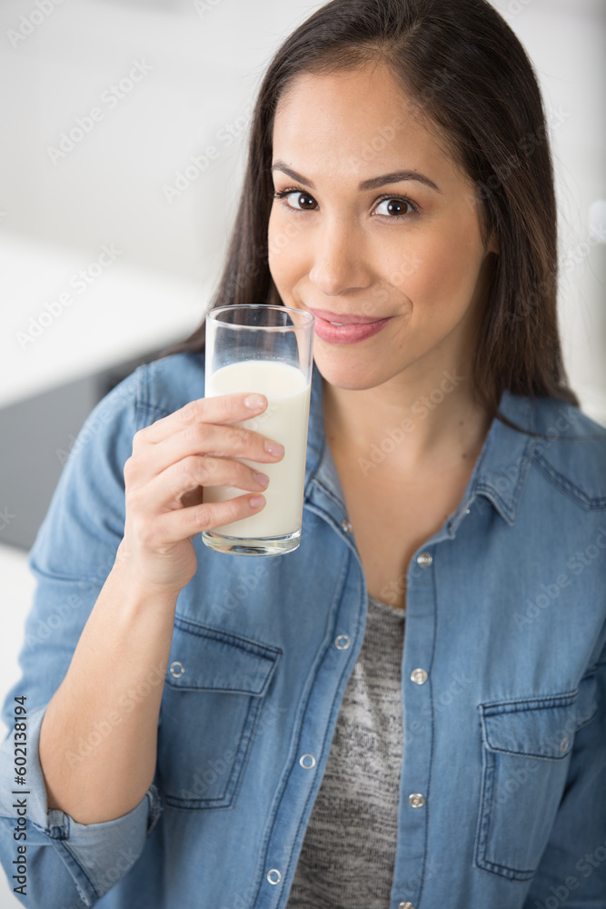 happy young woman drinking milk happy young woman drinking milk