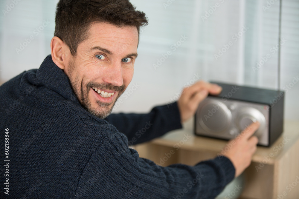 happy engineer repairing musical hi-fi system happy engineer repairing musical hi-fi system