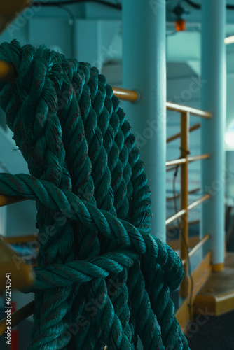 Rope on ferry boat at sea sailing dramatic moody cinematic cool tone