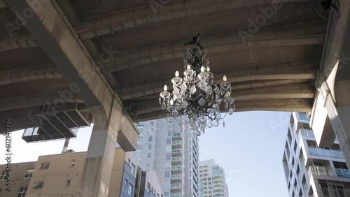 Chandelier art installation hanging from Granville Street Bridge in Downtown Vancouver, BC, Canada. 4K 24FPS photo