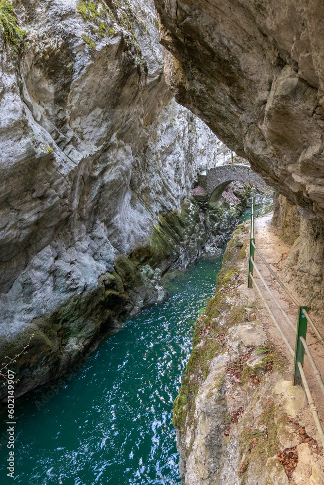 River in the Areuse gorge surrounded by steep cliffs, switzerland