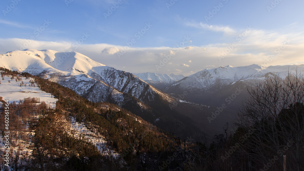 View of the snow-capped mountain peaks of Arkhyz