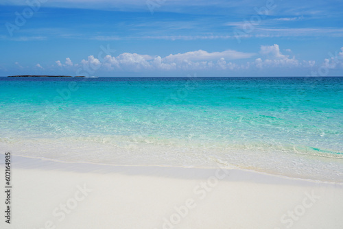 Tropical beach with white sand and blue water in Paradise Island, Bahamas © yobab