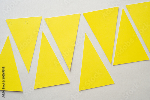 yellow paper triangles or bunting