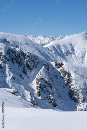 fresh snow covered mountains layers in winter. Aquila di Giaveno, Italian Alps