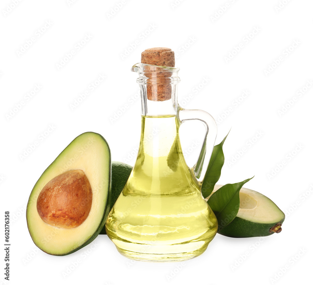 Cooking oil and fresh avocados isolated on white Cooking oil and fresh avocados isolated on white