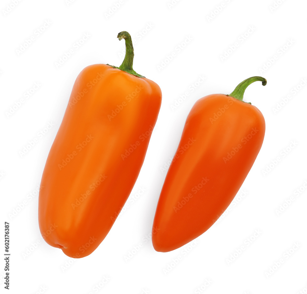 Fresh raw orange hot chili peppers isolated on white, top view Fresh raw orange hot chili peppers isolated on white, top view