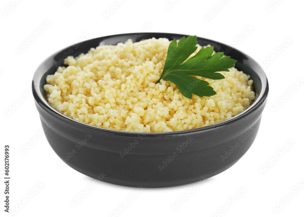 Tasty couscous with parsley on white background Tasty couscous with parsley on white background