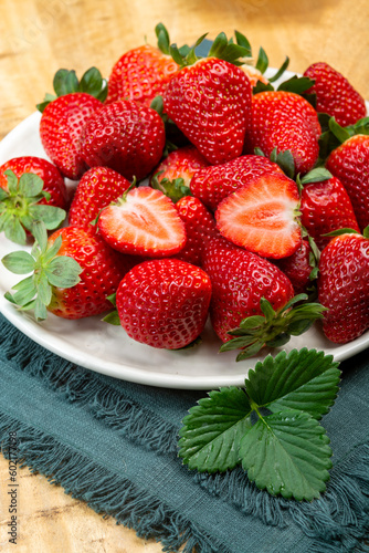New harvest, board with fresh ripe red sweet Spanish strawberry