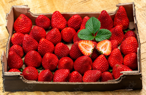 New harvest, 1 kilogram box of ripe red sweet Spanish strawberry
