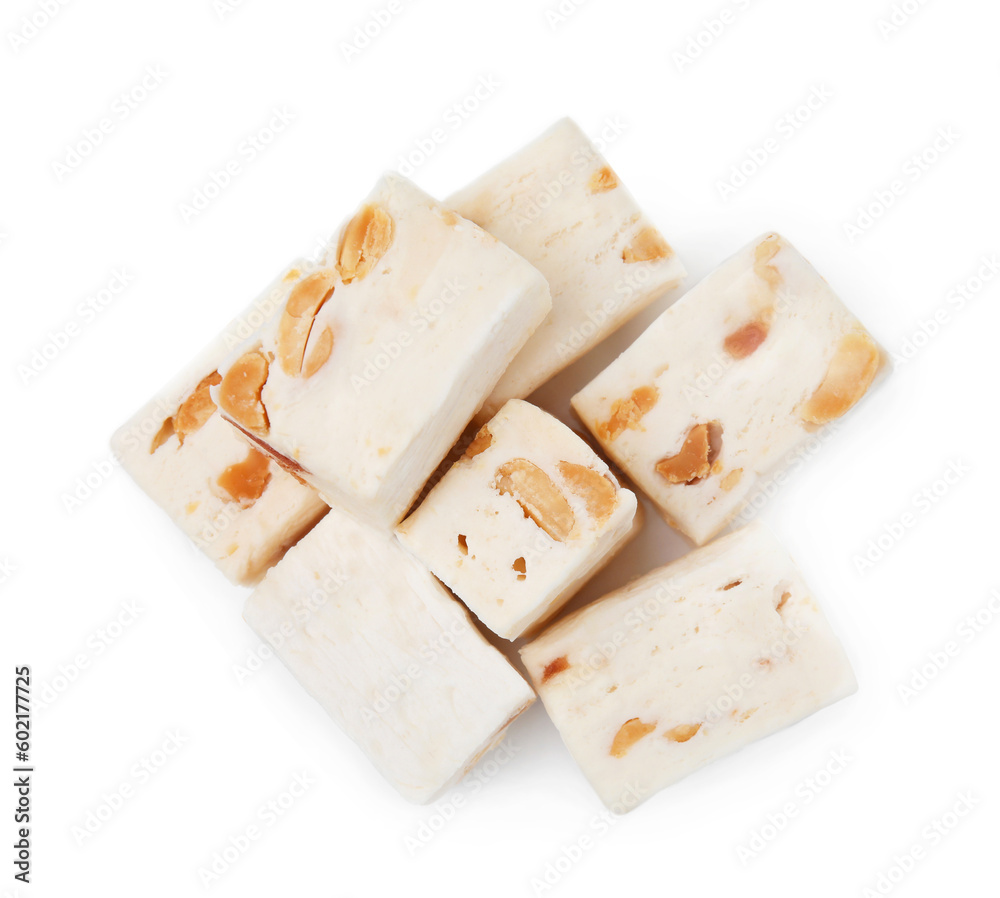 Many pieces of delicious nougat on white background, top view Many pieces of delicious nougat on white background, top view