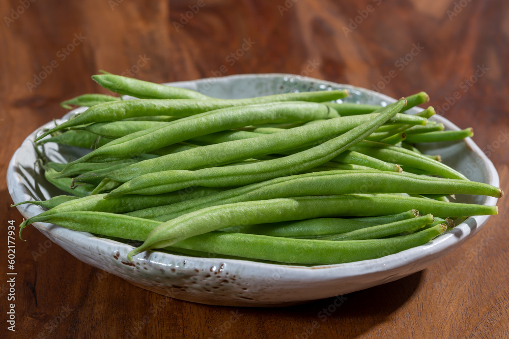 Raw fresh organic green beans ready to cook Raw fresh organic green beans ready to cook