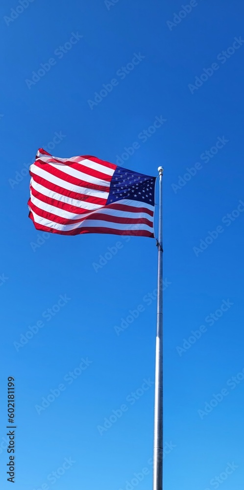 American flag against blue sky