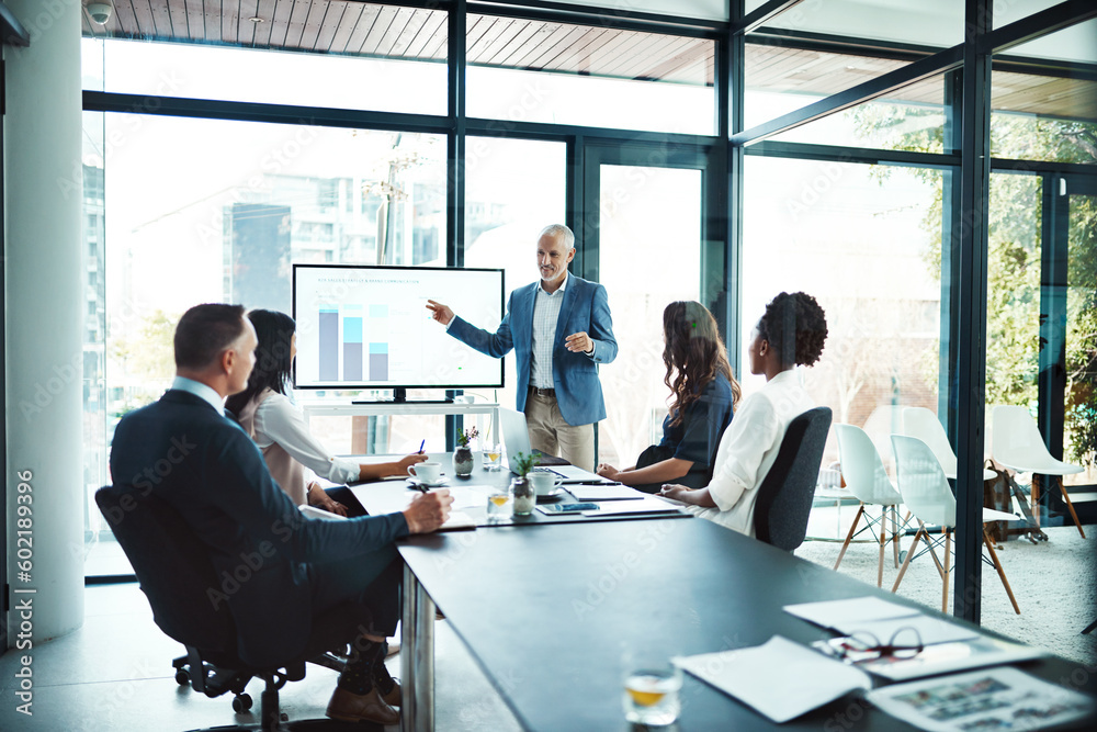 Business, charts and man with presentation, office and conversation for project, profit growth and meeting. Male leader, staff or group with teamwork, graphs or partnership in a boardroom or planning