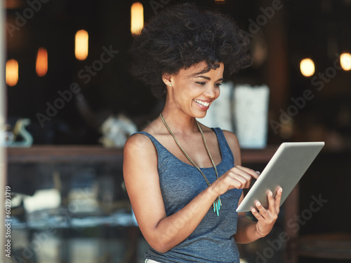 Tablet, typing and happy woman reading restaurant insight, review or smile for income, revenue or retail sales. Coffee shop report, small business growth and female manager with cafe store success
