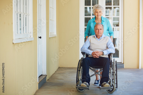 Portrait, old woman or senior man wheelchair in retirement home helping push husband for support. Happy people, mature couple or elderly lady with a mature person with a disability in house