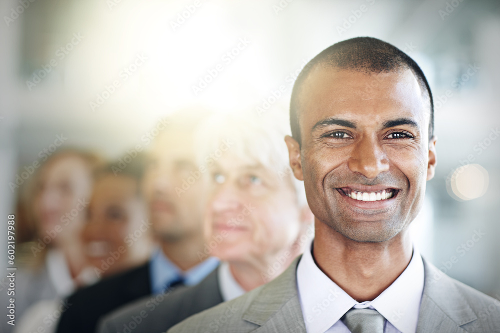 Happy businessman, portrait and face in management, leadership or diversity at office. Confident corporate man executive with smile in diverse group, teamwork or unity for company vision at workplace Happy businessman, portrait and face in management, leadership or diversity at office. Confident corporate man executive with smile in diverse group, teamwork or unity for company vision at workplace