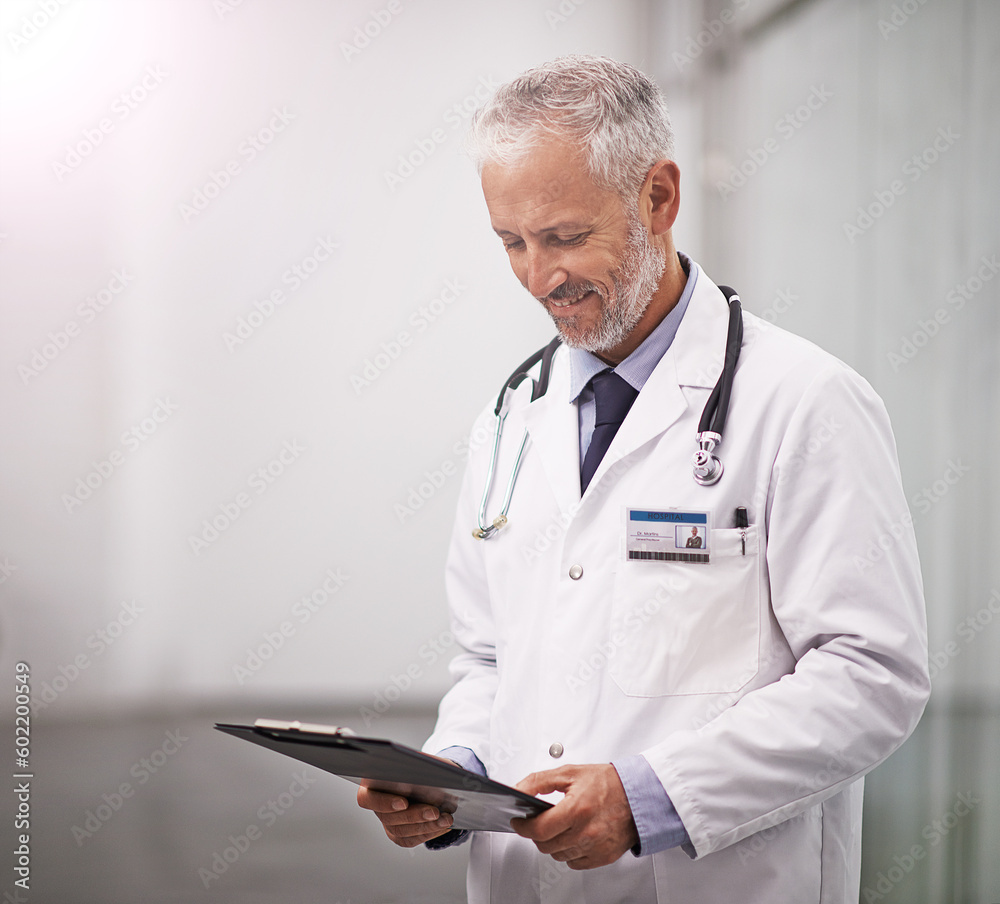 Healthcare, doctor and man reading clipboard with test results in hospital with health insurance mockup space. Professional male medical worker happy with document for consultation schedule or notes Healthcare, doctor and man reading clipboard with test results in hospital with health insurance mockup space. Professional male medical worker happy with document for consultation schedule or notes