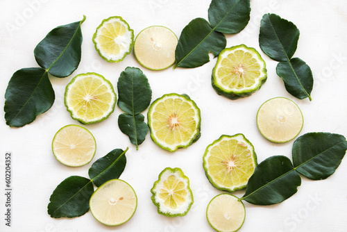 herbal vegetable kaffir lime, lemon slice local of asia arrangement flat lay postcard style on background white