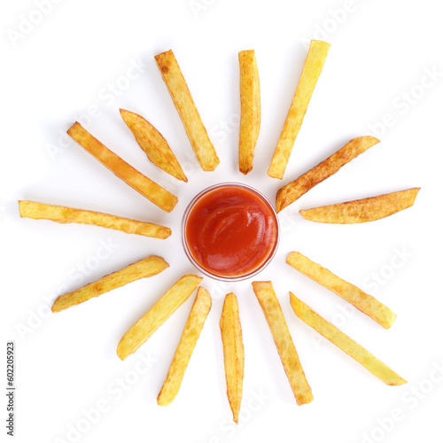 French fries potato chips with ketchup in shape of sun flat lay view from above