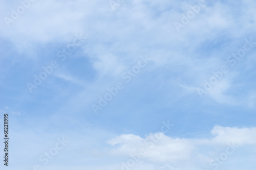 Early summer, bright light blue sky and clouds