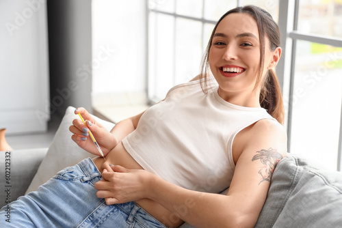Young diabetic woman giving...