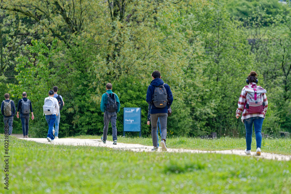 Students on the way to University Campus Irchel at City of Zürich on a cloudy spring morning. Photo taken May 9th, 2023, Zurich, Switzerland. Students on the way to University Campus Irchel at City of Zürich on a cloudy spring morning. Photo taken May 9th, 2023, Zurich, Switzerland.
