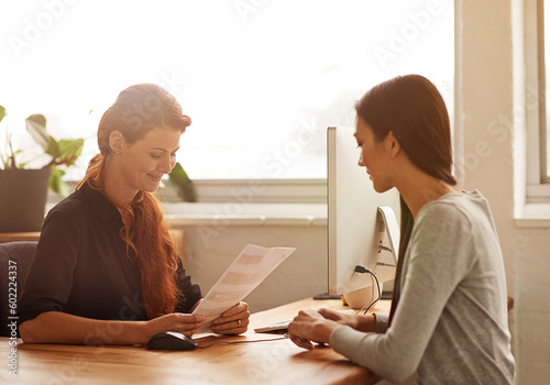 Meeting, interview and business women in office with documents for planning, resume and hiring. Communication, teamwork and female workers with paperwork for hr review, recruitment and proposal