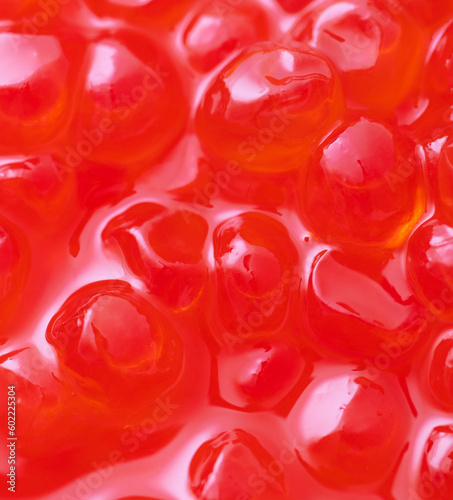 Red salmon caviar as a background. Macro. © schankz