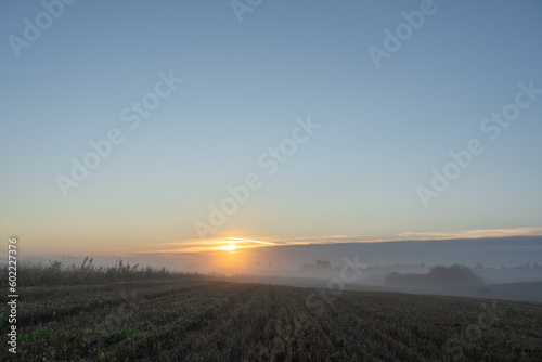 sunrise, foggy morning in the countryside © Ieva