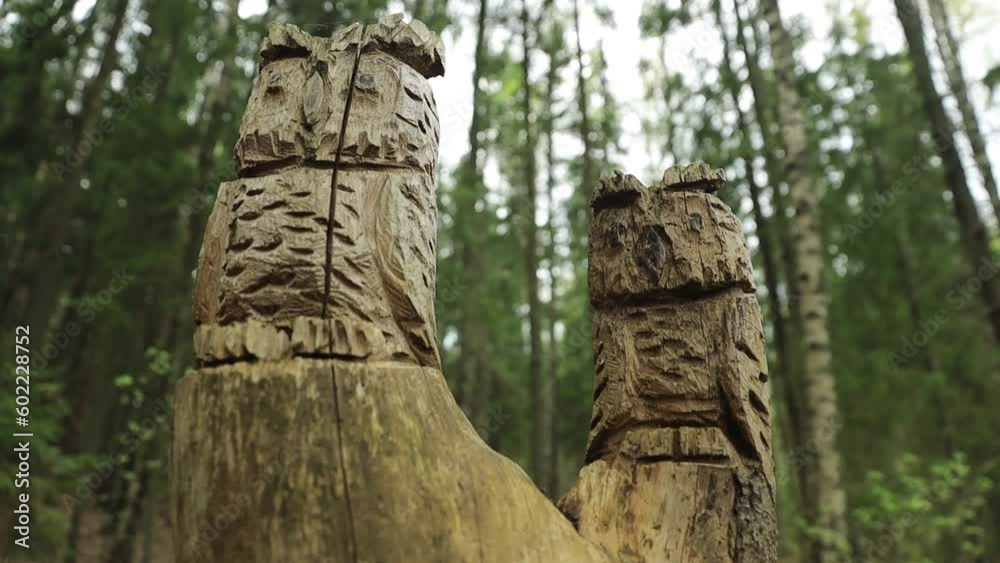 animal figurines carved from wood in the park animal figurines carved from wood in the park
