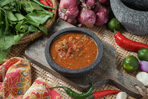A famous condiment in Malaysia is 'Sambal Belacan' and in Indonesia  is 'Sambal Terasi'