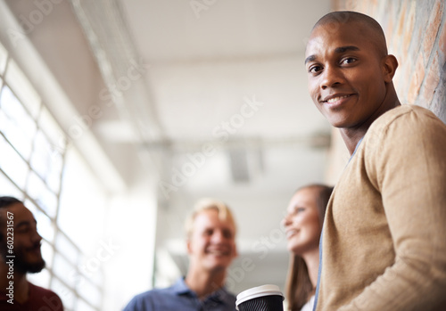 Education, university and happy portrait of black man with smile for motivation, knowledge and learning. College, academy and male student with friends in campus hallway for studying, class or school